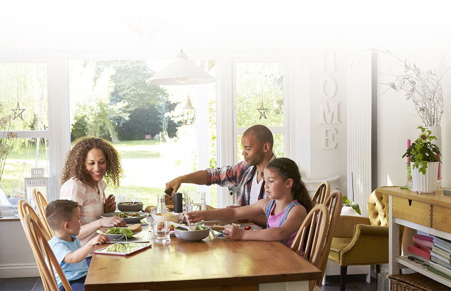 family eating at dining table