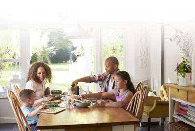 family eating at dining table