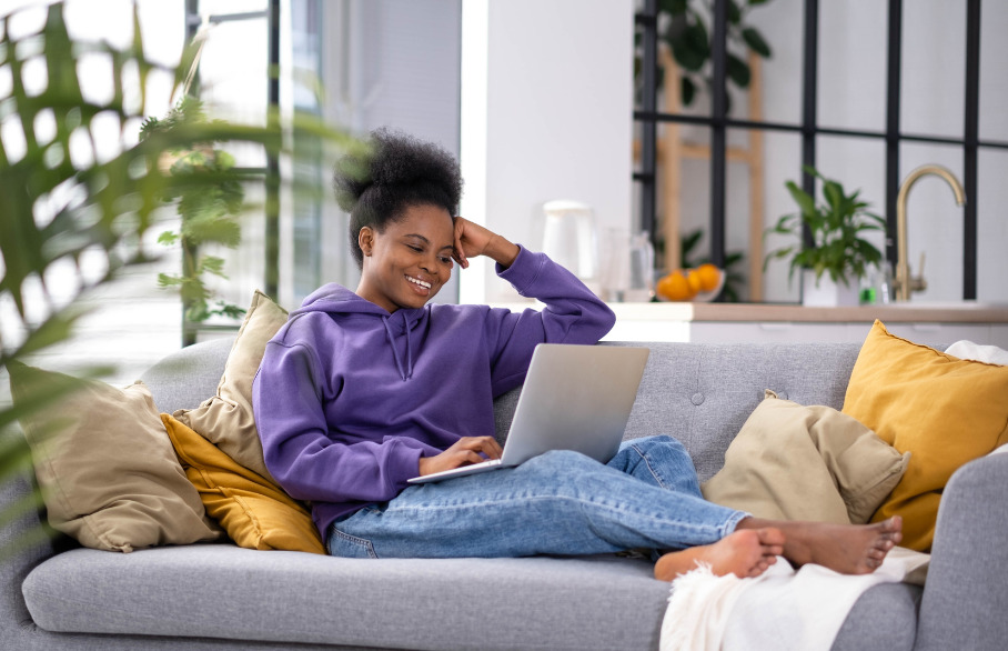 Women on the Sofa using Laptop