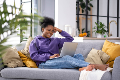 Women on the Sofa using Laptop